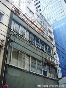 塚越