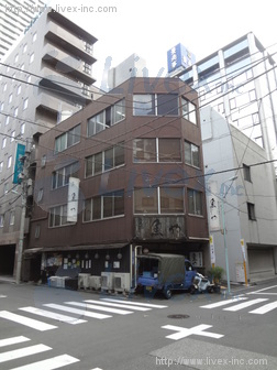 岡