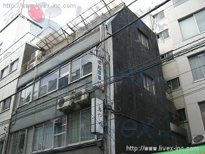塚越