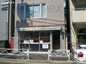 岡